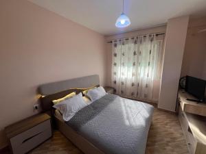 Voodi või voodid majutusasutuse Piazza Place toas
