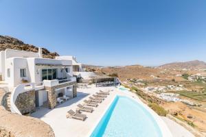 a view of a villa with a swimming pool at Luxury villa with stunning views above Kalo Livadi in Mýkonos City