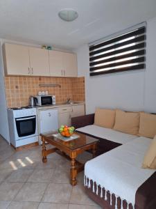Η κουζίνα ή μικρή κουζίνα στο Apartman DADO
