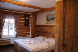 Postel nebo postele na pokoji v ubytování Penzion Brnenka