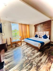 Postel nebo postele na pokoji v ubytování Hotel Royal Orbit By Arony Hospitality Dehradun