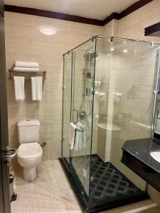 Koupelna v ubytování Panacea Suites Hotel