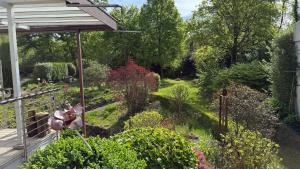 a garden from the balcony of a house at Casa Emilio in Rüsselsheim