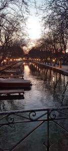 a view of a river with boats in it at La petite Venise des Alpes, Ultra centre 1 à 5 Pers in Annecy