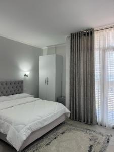 Postel nebo postele na pokoji v ubytování DIELL HOTEL