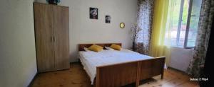 Postel nebo postele na pokoji v ubytování Iveri House