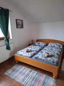 Posteľ alebo postele v izbe v ubytovaní House Mara