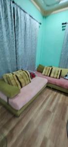 two bunk beds in a room with a wooden floor at Homestay Firmasari Jepak in Bintulu