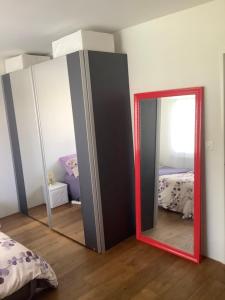 Letto o letti in una camera di Chambre spacieuse, lumineuse et reposante