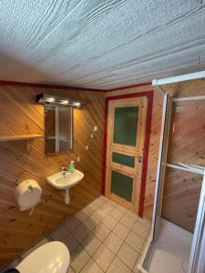 Koupelna v ubytování Fjordcamp + 37 fotografií