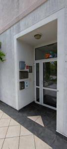 an entrance to a building with an open door at Maris in Novi Vinodolski +34 photos