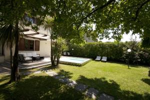 Jardín al aire libre en Villa Nicolina