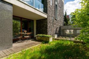 Κήπος έξω από το Jesionowa Homely Apartment with Garden
