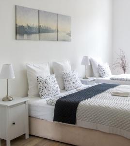 Postel nebo postele na pokoji v ubytování Penzion Apartmány Hradební