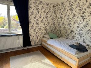 Postel nebo postele na pokoji v ubytování Hus Mio