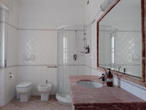 Koupelna v ubytování ALGHERO SEASIDE Guest House - Affittacamere + 12 fotografií