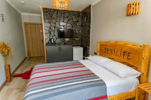 Postel nebo postele na pokoji v ubytování Zenilife Suit Apart & Bungalov
