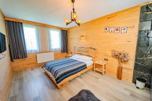 Postel nebo postele na pokoji v ubytování Zenilife Suit Apart & Bungalov