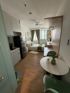 Ένα ή περισσότερα κρεβάτια σε δωμάτιο στο Nest Heaven Host