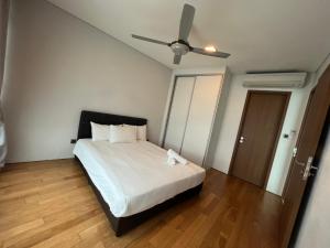 Ένα ή περισσότερα κρεβάτια σε δωμάτιο στο Vortex Residence KLCC Bukit Bintang Kuala Lumpur