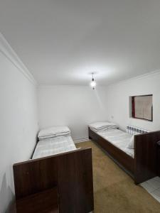 Giường trong phòng chung tại Hostel Buxoriy +6 ảnh