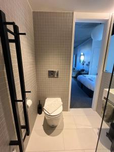 Koupelna v ubytování Contemporary City Studio