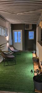 Ein Sitzbereich in der Unterkunft Apartment Viktorija
