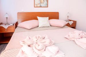 Postel nebo postele na pokoji v ubytování Volos City Αpartment #1