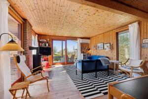 TV/trung tâm giải trí tại Cozy Cottage With A Beautiful View