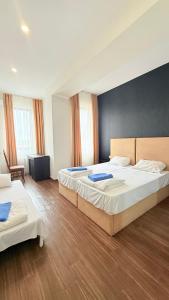 Voodi või voodid majutusasutuse Star Hotel toas