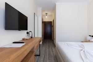 TV a/nebo společenská místnost v ubytování B Boutique Hotel