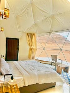 Ένα ή περισσότερα κρεβάτια σε δωμάτιο στο Rum STARS GATE Camp