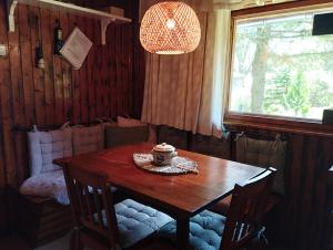 a wooden table with a tea pot on top of it at 4Rest&Fun Krušné hory in Klíny