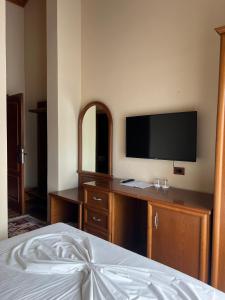 Postel nebo postele na pokoji v ubytování B Boutique Hotel