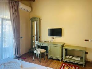 TV a/nebo společenská místnost v ubytování B Boutique Hotel + 37 fotografií