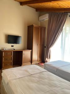 Postel nebo postele na pokoji v ubytování B Boutique Hotel
