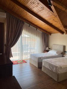 Postel nebo postele na pokoji v ubytování B Boutique Hotel