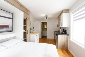 Η κουζίνα ή μικρή κουζίνα στο Hôtel les quatre bonheurs +32 φωτογραφίες