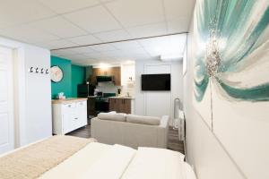 Μια τηλεόραση ή/και κέντρο ψυχαγωγίας στο Hôtel les quatre bonheurs