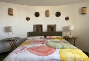 A bed or beds in a room at Villa Federica