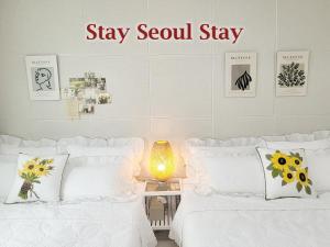 Postel nebo postele na pokoji v ubytování Stay Seoul Stay