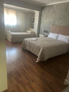 Ένα ή περισσότερα κρεβάτια σε δωμάτιο στο Apartamento turísticos ilusiones 1
