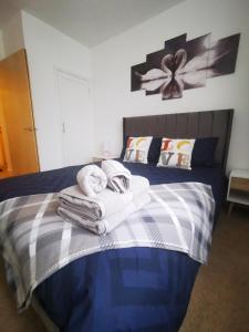 Postel nebo postele na pokoji v ubytování Stevenson Apartment in Oban City