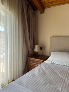 Postel nebo postele na pokoji v ubytování B Boutique Hotel