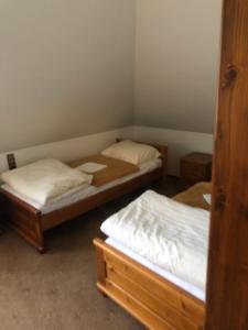Katil atau katil-katil dalam bilik di Pasterniki Apartament