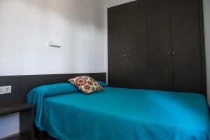 Postel nebo postele na pokoji v ubytování RVApartaments Treumal Park