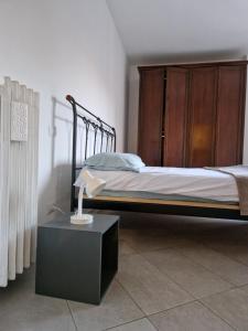 Posteľ alebo postele v izbe v ubytovaní Appartamento Michelino - in fiera portello