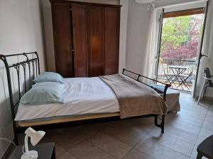 Posteľ alebo postele v izbe v ubytovaní Appartamento Michelino - in fiera portello