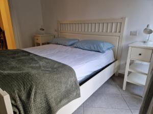 Posteľ alebo postele v izbe v ubytovaní Appartamento Michelino - in fiera portello