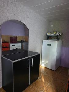 Kuchyň nebo kuchyňský kout v ubytování Gabala Garden hostel